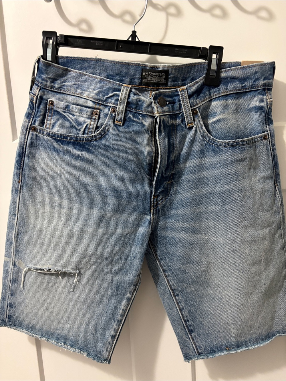 Medium Wash Blue Distressed Denim Jean Shorts by Levi Strauss & Co